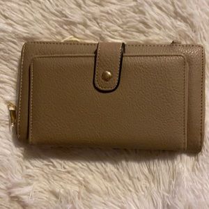 Taupe or tan crossbody travel size bag